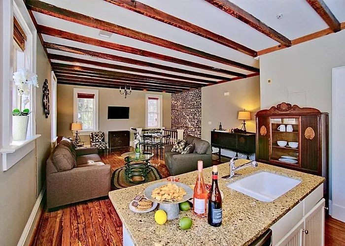 Comfy Carriage House Steps From The River